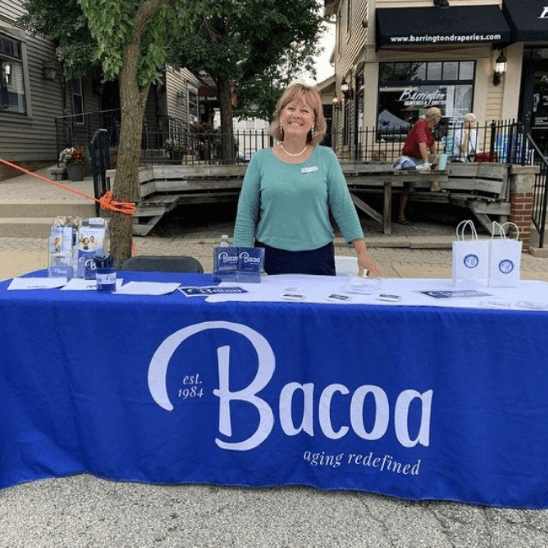Terri Channer of Bacoa at Information Table with Social Services