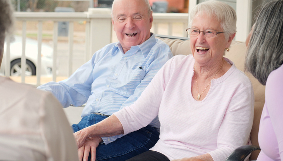 Two Older Adults Smiling and Laughing