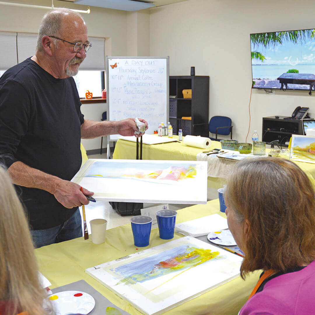 Watercolor painter Michael Ireland with Bacoa members