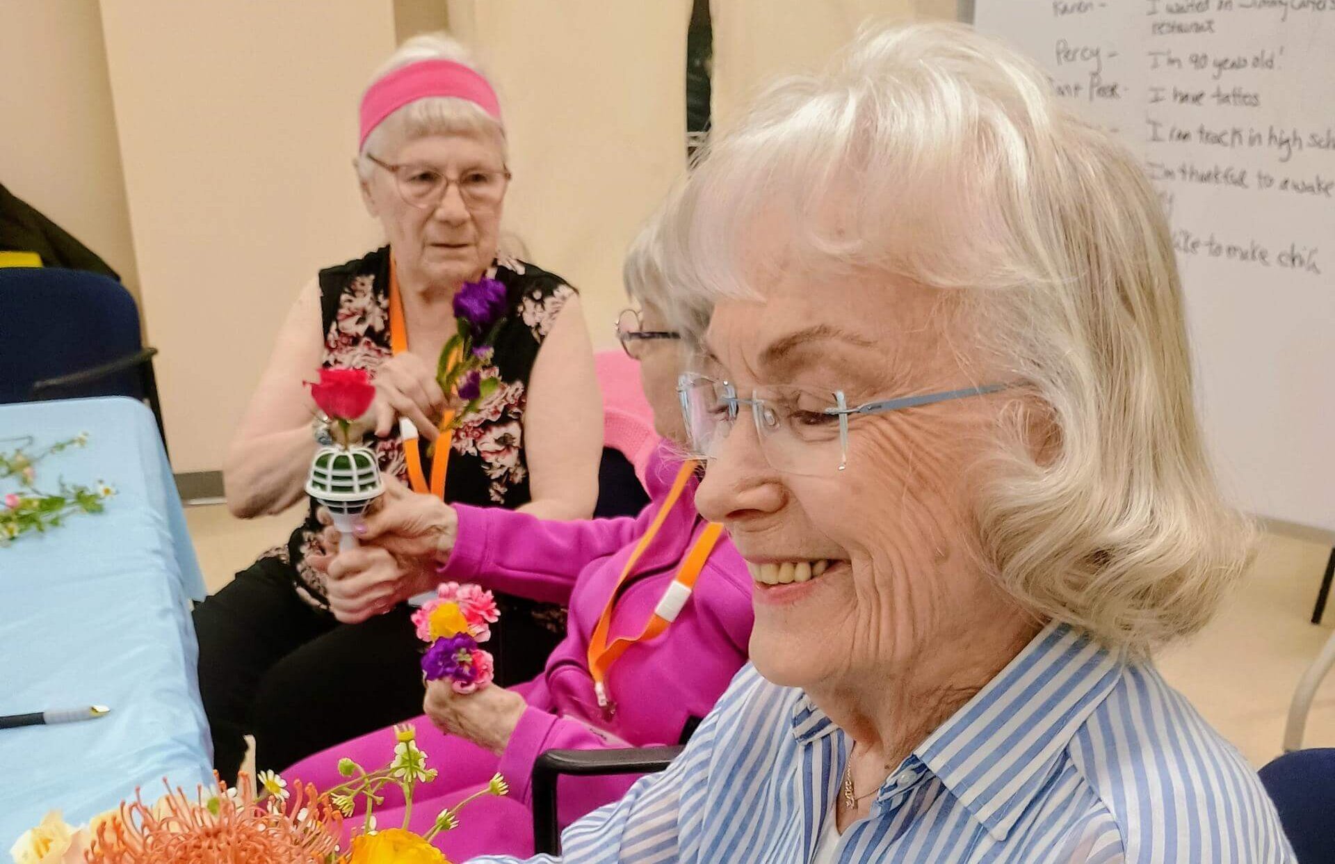 A Day Out Participants creating floral arrangements